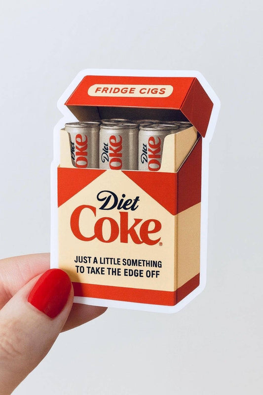 A hand with red nail polish holds the Diet Coke Fridge Cigs Sticker by Hello Brand | Sticker My Art, featuring a weather-resistant vinyl design of a cigarette pack filled with Diet Coke cans and cheeky text.