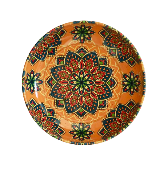 Introducing the Mini Metal Serving Bowl - Luna Pattern by Esthetic Living: This captivating round bowl showcases a symmetrical mandala motif in vibrant red, green, and yellow tones against an orange background.