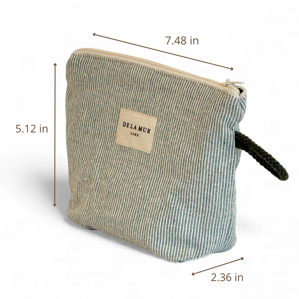 Introducing the Striped Small Makeup Bag – Light Green & Green (Teo) by DE LA MUR LINE US Inc, a jacquard fabric pouch with a zipper closure and black handle. Ideal as a makeup bag, it is crafted in Barcelona and measures 7.48 inches wide, 5.12 inches tall, and 2.36 inches deep.
