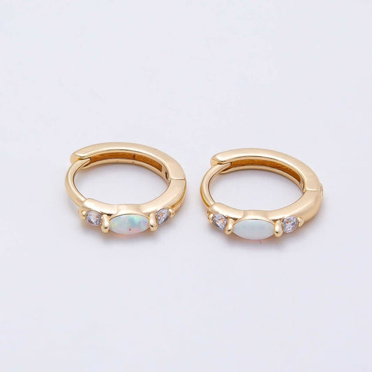 Aim Eternal Gold Filled 13mm White Opal/CZ Huggie Hoops featuring a central white opal flanked by two small clear stones.
