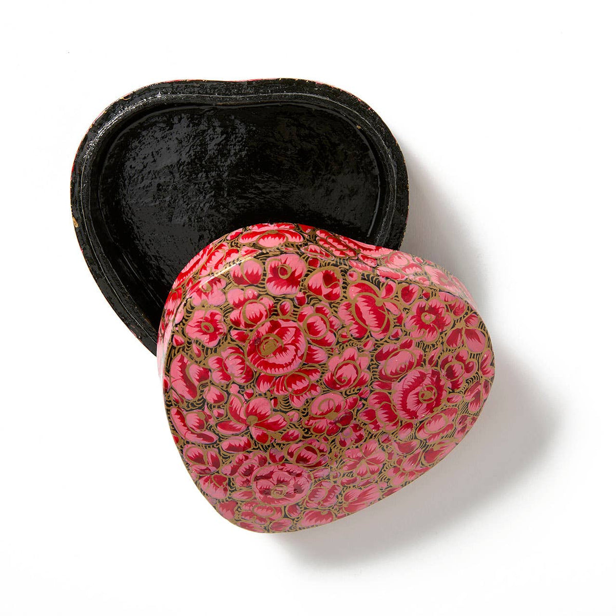 Heart-shaped, hand-painted Beloved Heart Kashmiri Box - Pink with a pink and gold floral pattern, shown with the lid slightly ajar to reveal a black interior.