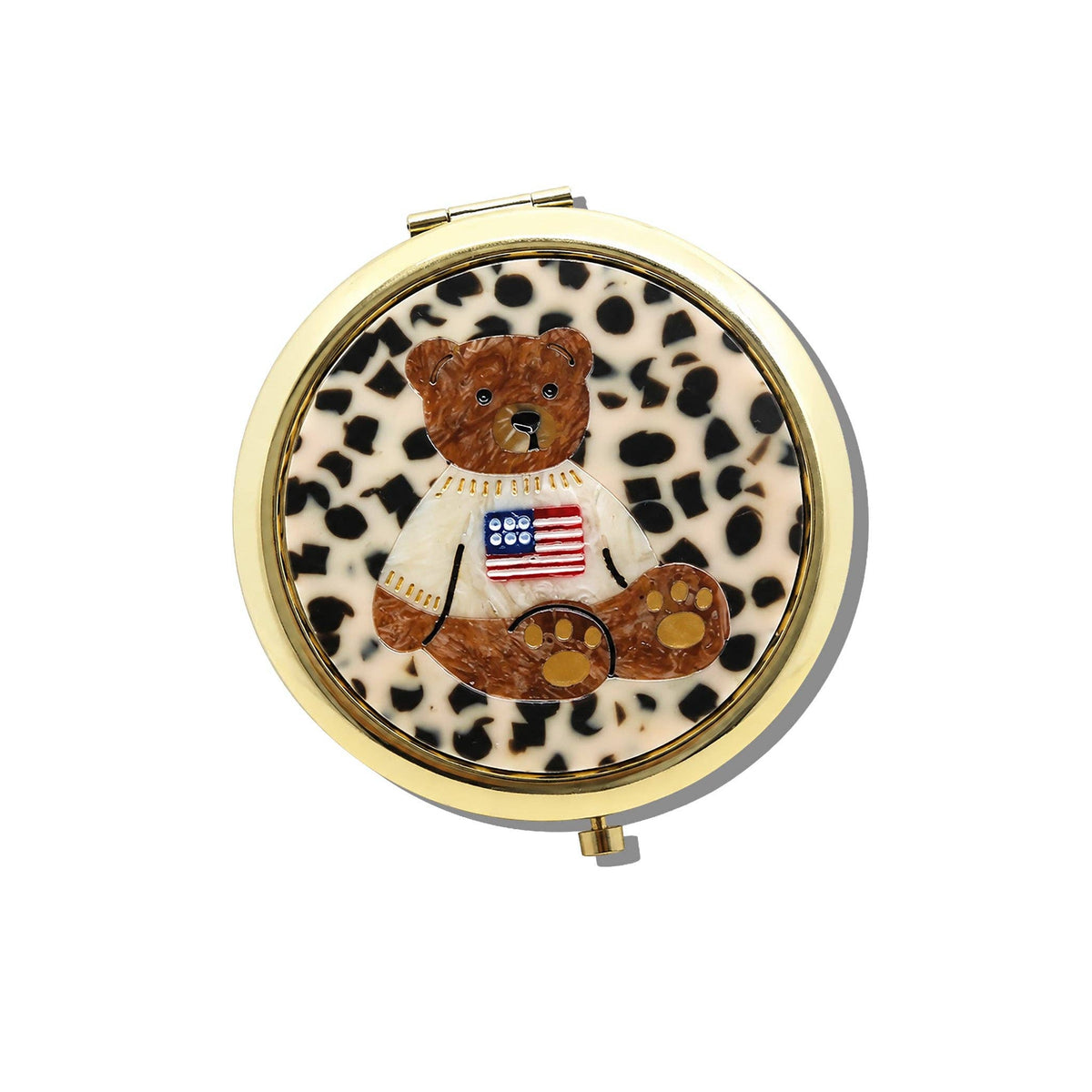 Solar Eclipse Teddy Bear Americana Handbag Hero Pill Compact featuring a gold-toned case with a hand-painted brown teddy bear wearing an American flag sweater on a leopard print background.