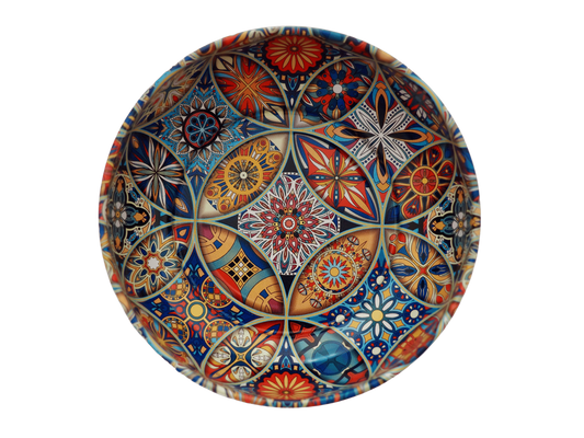 The Esthetic Living Mini Metal Serving Bowl, featuring the Derya Pattern, showcases intricate and colorful geometric and floral motifs in blue, red, orange, and yellow.