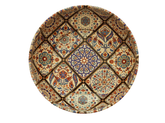 A round mini metal serving bowl from Esthetic Living, featuring the Miray pattern with intricate, colorful geometric and floral designs arranged in a grid, food safe and for serving nuts, viewed from above on a white background.