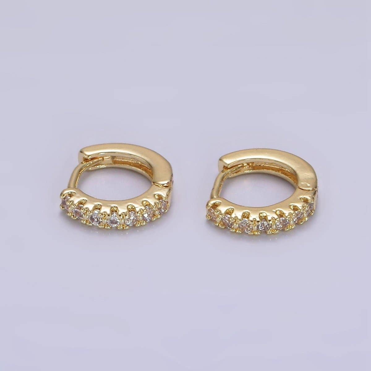 Aim Eternal Tiny CZ Clicker Hoops - Gold Filled 10mm: two 10mm gold-filled mini hoops, each set with a row of clear pave CZ stones.