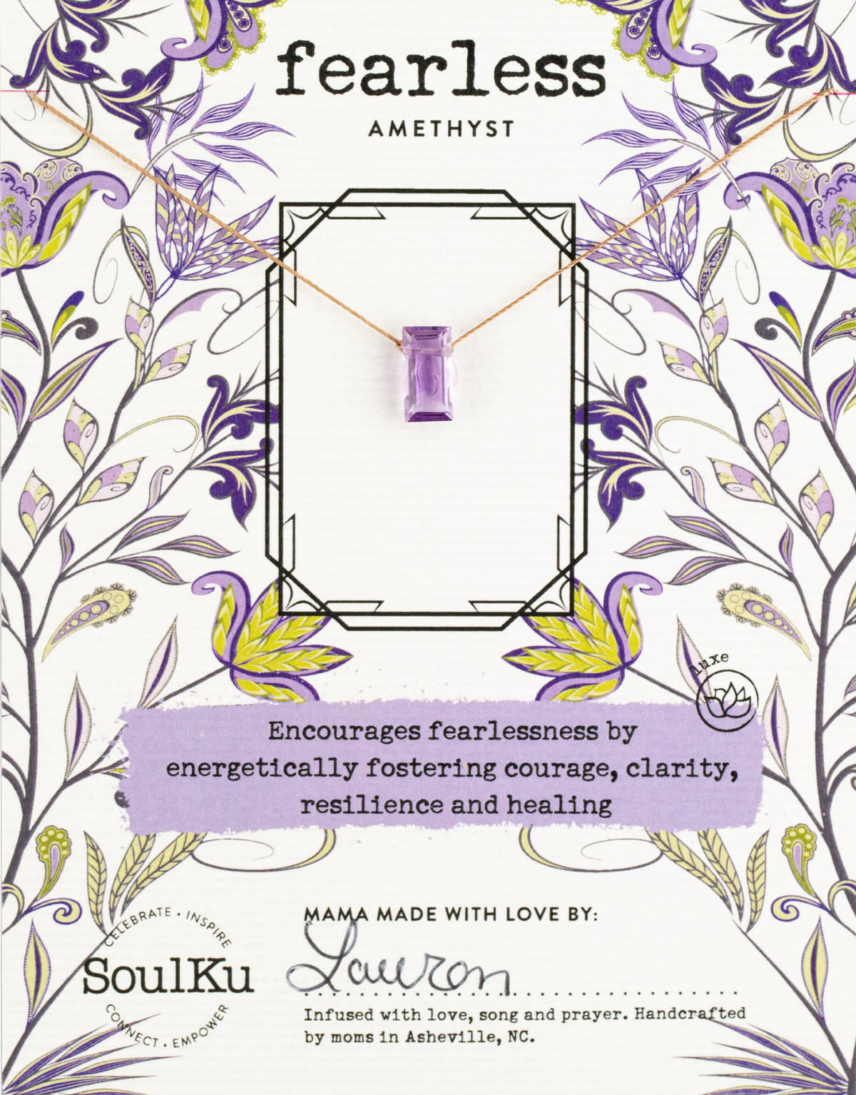 A card with floral designs displays the SoulKu Amethyst Refined Necklace for Fearless. This handmade jewelry inspires courage, clarity, resilience, and healing. Handcrafted by moms in Asheville, NC.