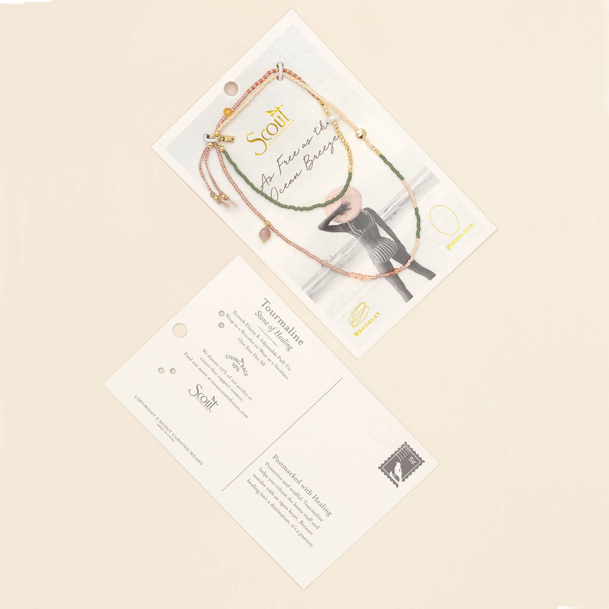 Two postcards are arranged on a light beige background: one features a photo of a person in a hat wearing two Scout Curated Wears Mixed Media Wrap Bracelets/Necklaces—crafted with Japanese Miyuki Beads and gold accents for healing with tourmaline—while the other displays text about tourmaline’s properties and bracelet details.