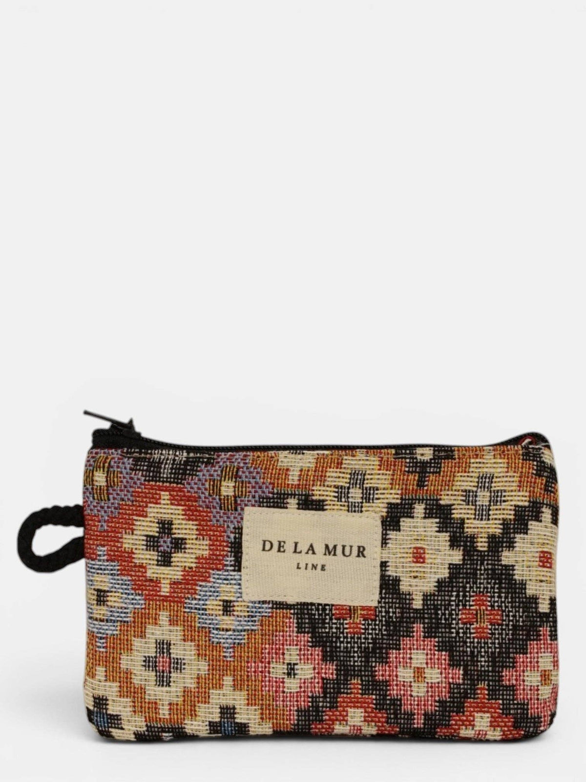Introducing the Geometric Jacquard Coin Purse – Multicolor (Ore) by DE LA MUR LINE US Inc: a small rectangular purse showcasing a vibrant geometric pattern and crafted from premium jacquard fabric. It features a black zipper, a sturdy rope handle, and a front label with the DE LA MUR LINE logo, all set against a plain white background.