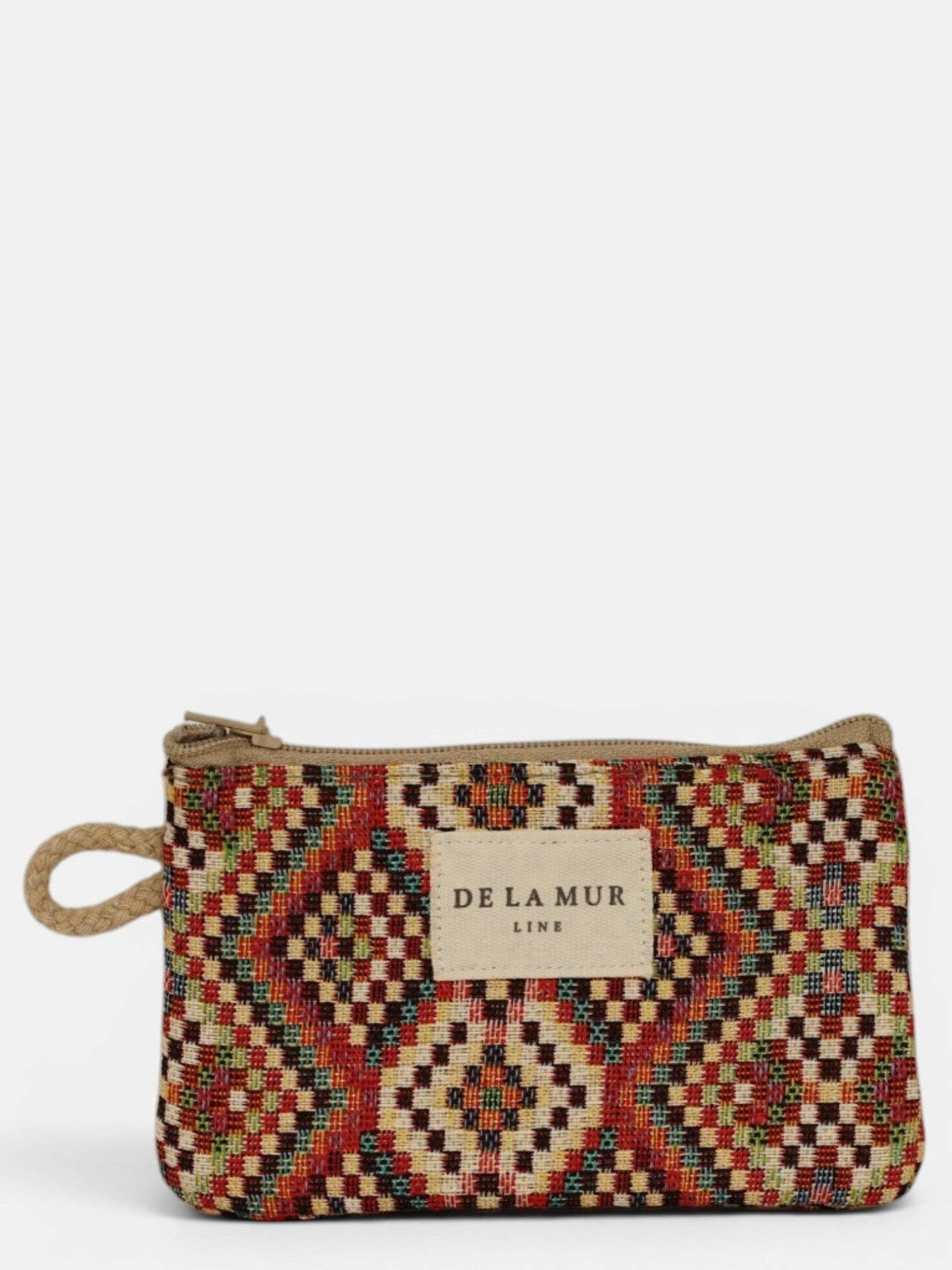 Introducing the Geometric Jacquard Coin Purse – Red Multicolor (Otto) by DE LA MUR LINE US Inc: a compact zippered coin purse crafted from jacquard fabric showcasing a woven geometric pattern in red, brown, and beige hues, finished with a beige label displaying the brand’s name.