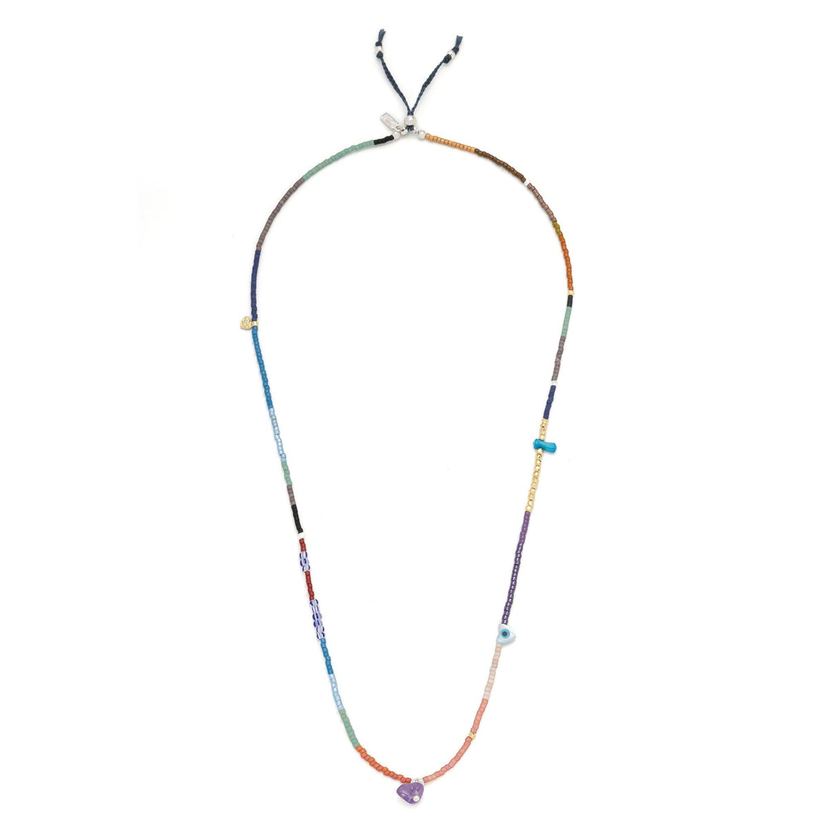 Scout Curated Wears’ Mixed Media Wrap Bracelet/Necklace - Protection/Amethyst/Gold features a vibrant arrangement of small, multicolored Miyuki beads, highlighted by a central purple amethyst heart-shaped bead and accented with unique, irregularly shaped gold-toned beads. Shown on a white background.
