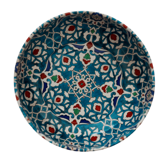 The Esthetic Living Mini Metal Serving Bowl features the Aysun pattern, showcasing intricate blue, white, red, and green floral and geometric designs inspired by traditional Middle Eastern or Islamic art—motifs often seen on decorative bowls and mini bowls.