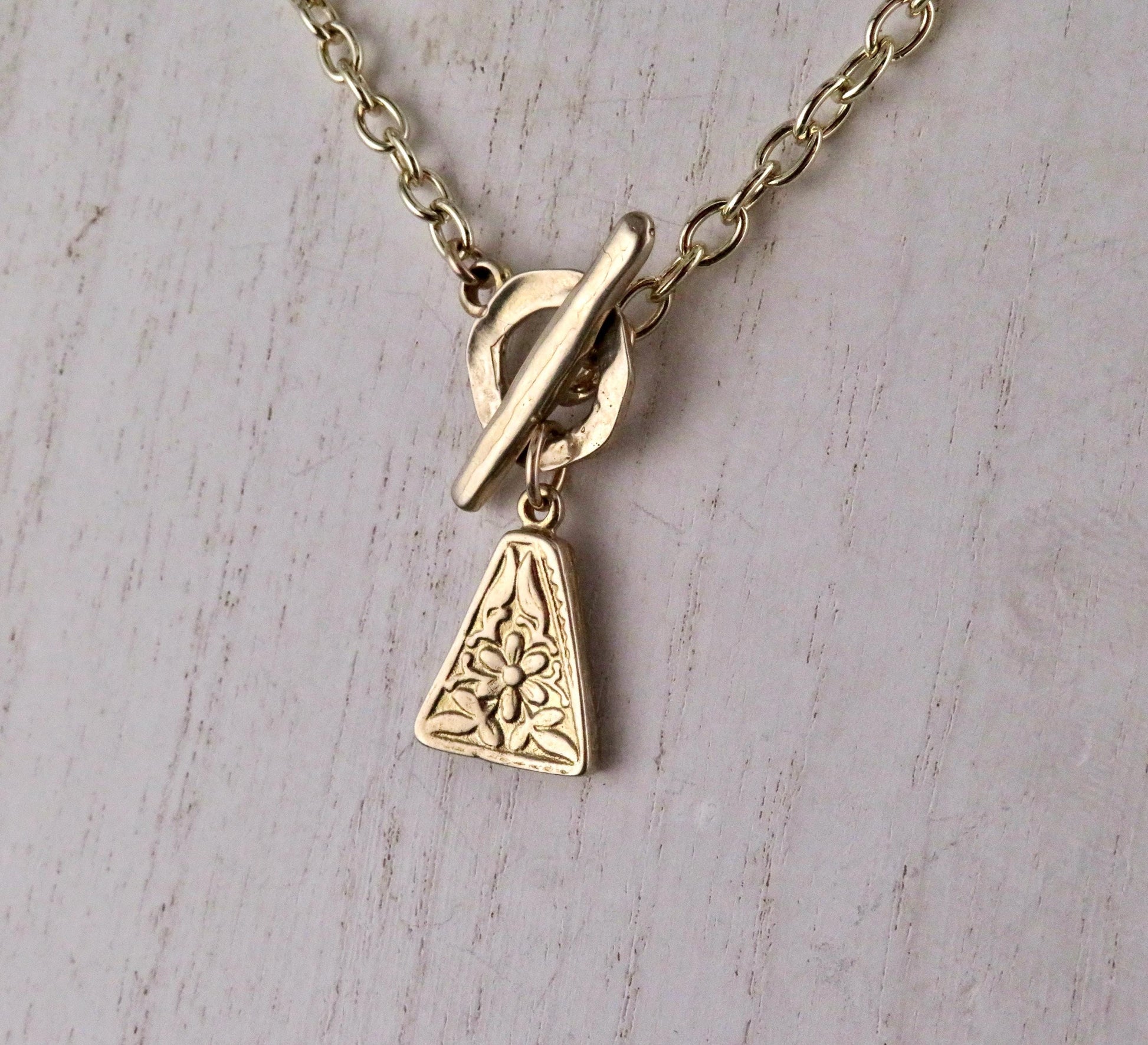 Gold Nature Necklace | Bronze Floral Pendant | Gold Rustic Flower Charm | Triangle Unique | Organic Necklace